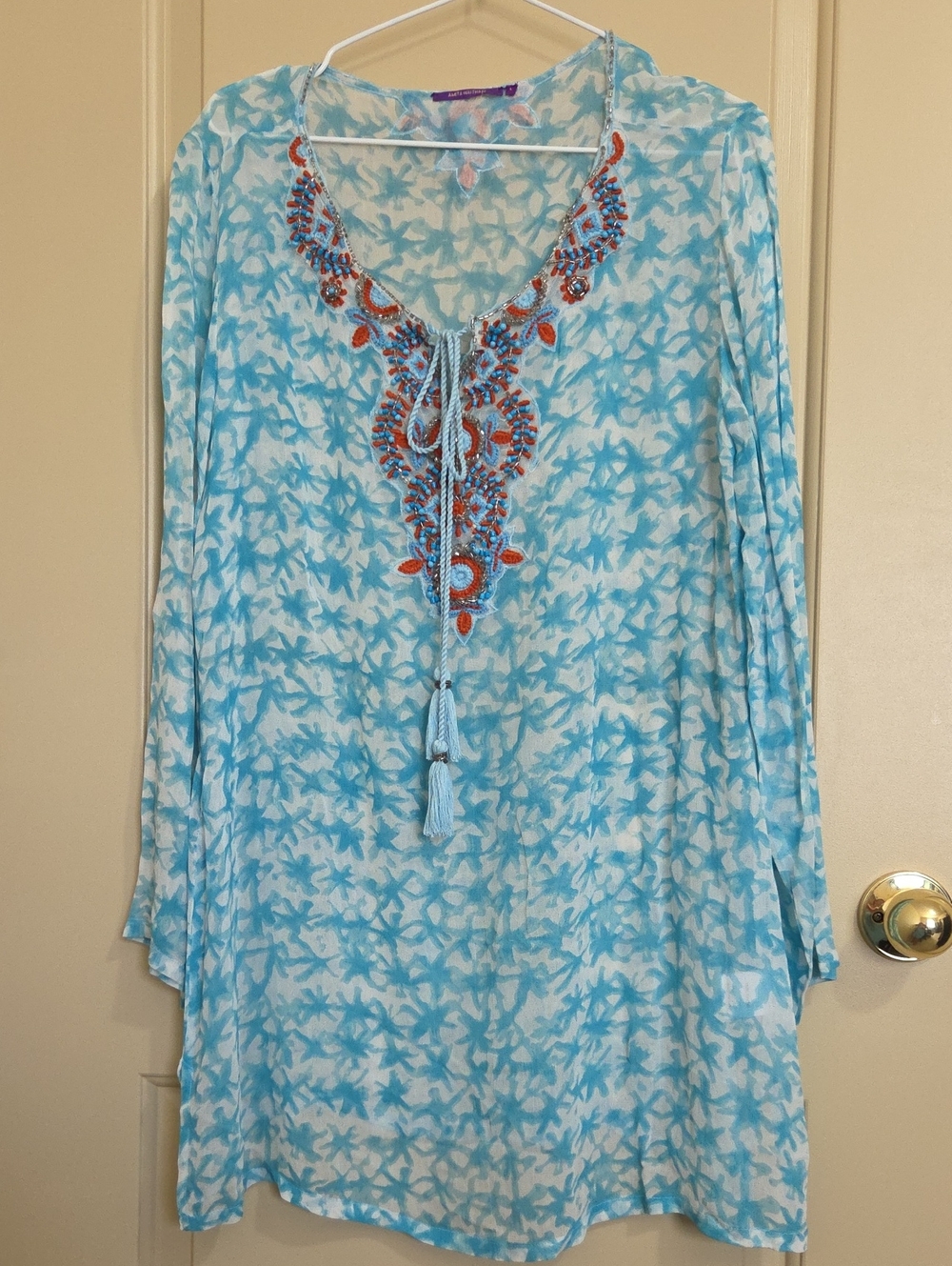 Amita Naithani Women’s Light Blue Embroidered Tunic Top with Tassel Tie